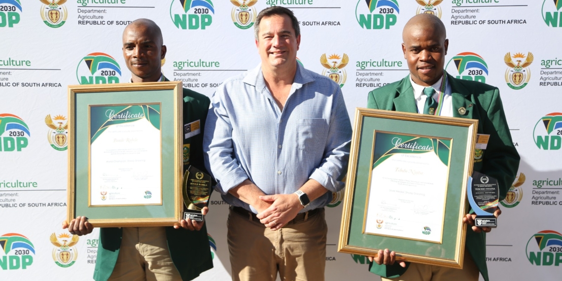 Agriculture minister John Steenhuisen with South African sheep shearing champions Bonile Rabela and Teboho Nyatsa after the country secured a sixth consecutive world hand shearing title. Photo: Supplied/Food For Mzansi