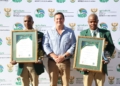 Agriculture minister John Steenhuisen with South African sheep shearing champions Bonile Rabela and Teboho Nyatsa after the country secured a sixth consecutive world hand shearing title. Photo: Supplied/Food For Mzansi