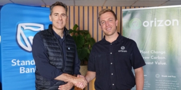 Bill Blackie, chief executive of business and commercial banking at Standard Bank Group, and Michael Lilje, CEO and founder of Orizon Agriculture, announce a new partnership aimed at enabling South African farmers to turn regenerative farming practices into verified carbon credits and additional income opportunities. Photo: Supplied/Standard Bank