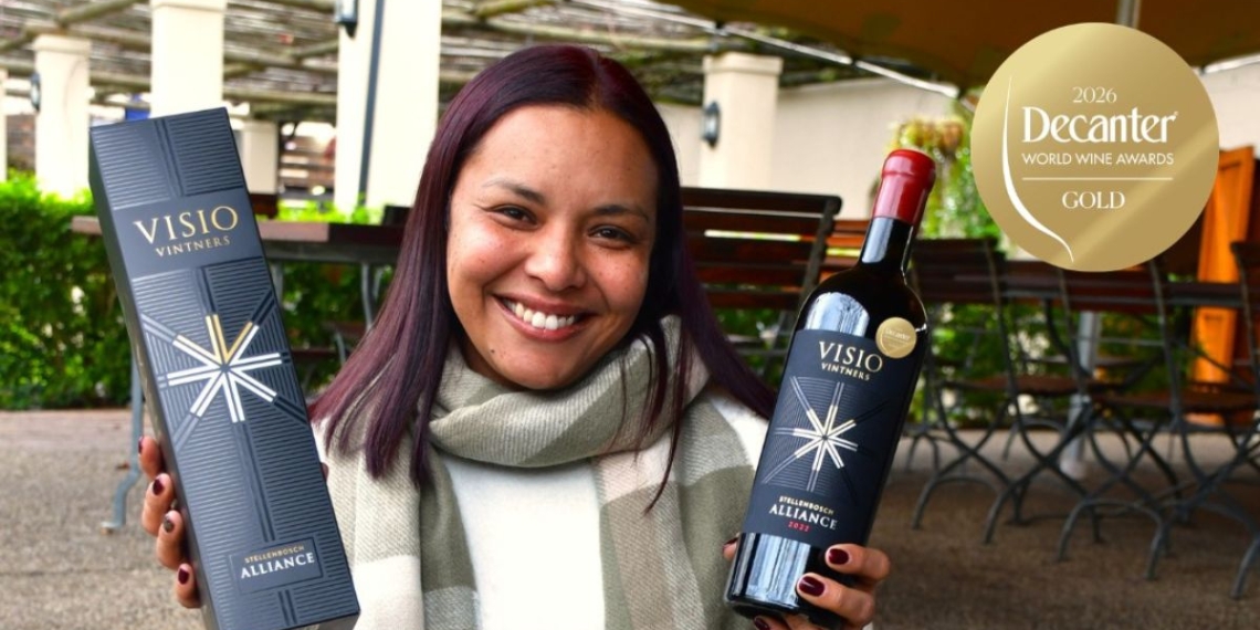Anesca Achilles, marketing co-ordinator of Visio Vintners, with the Decanter awarded wine. Photo: Supplied/Food For Mzansi