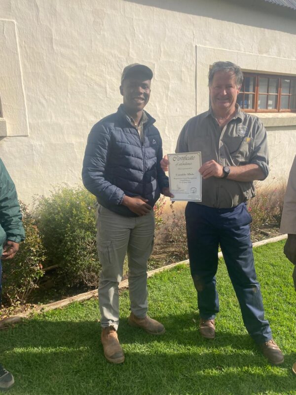 Uzusakhe Mbebe also holds a certificate in Regenerative Land Management from the Savory Institute, which was presented to him by Roland Kroon. Photo: Supplied/Food For Mzansi
