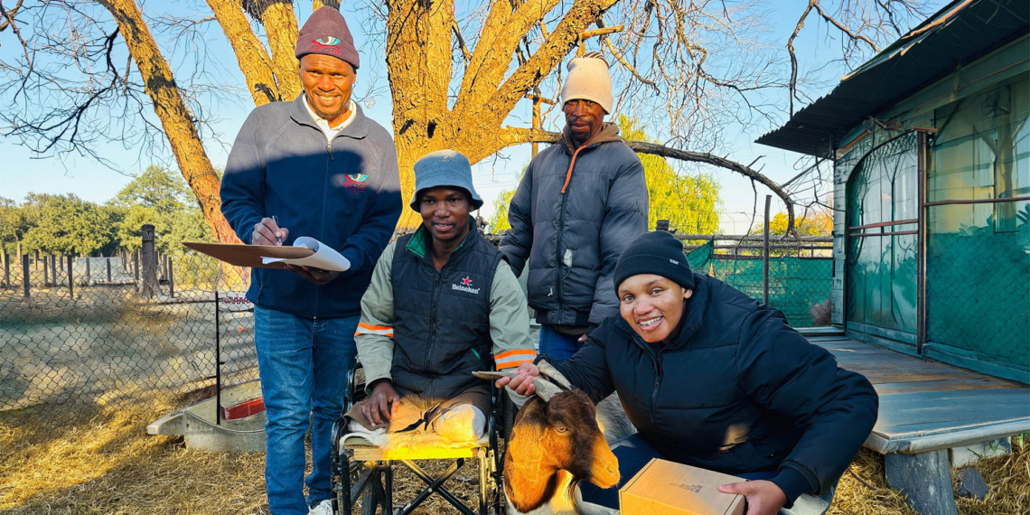 Realeboga Mangwegape (in the wheelchair) with Agricultural Research Council officials. Photo: ARC